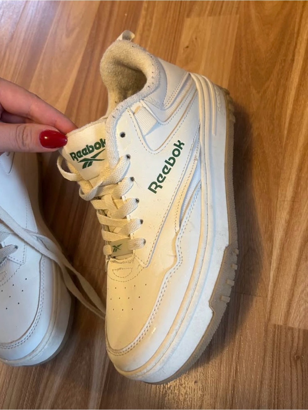 Reebok Women’s White Sneakers with Green Logo Accents